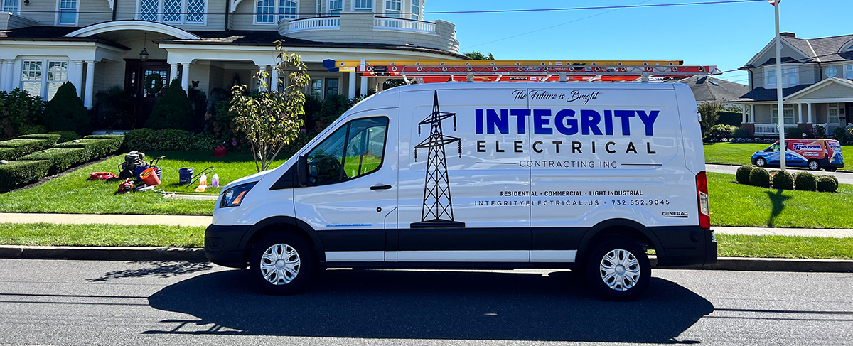 Residential home-service van parked in front of houses